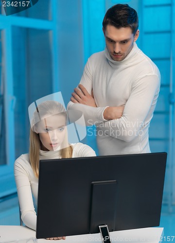 Image of man and woman in laboratory