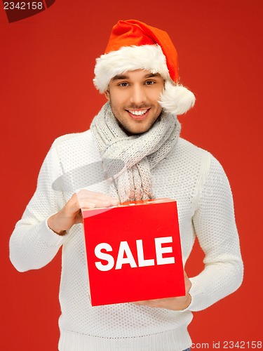 Image of handsome man in christmas hat