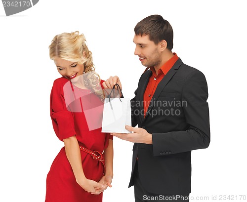 Image of man and woman with present