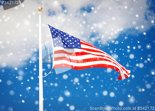 Image of american flag flying in the wind