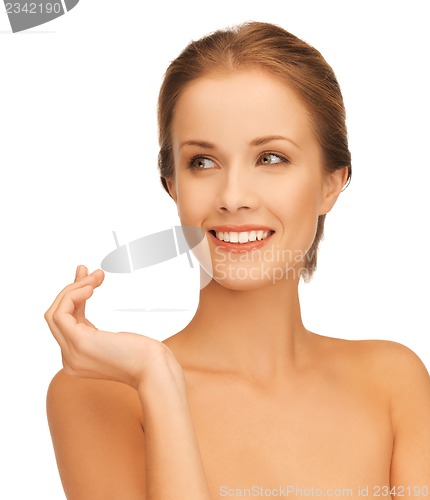 Image of beautiful woman with moisturizing creme drop