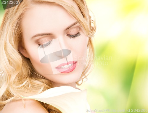 Image of beautiful woman with calla flower