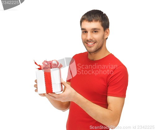 Image of handsome man with a gift