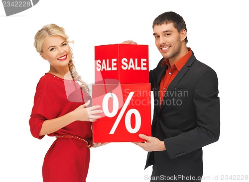 Image of man and woman with percent sign