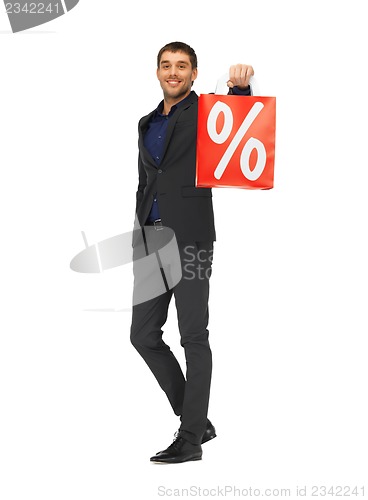 Image of handsome man in suit with percent sign