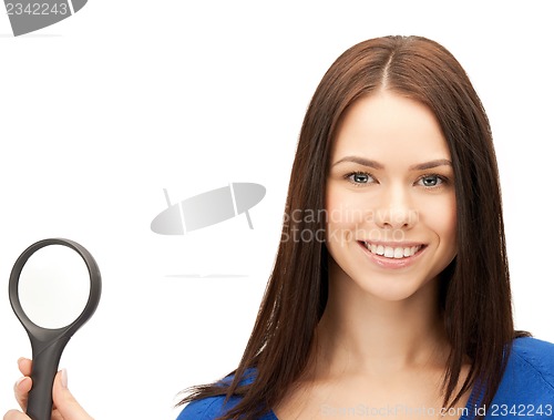 Image of woman with magnifying glass