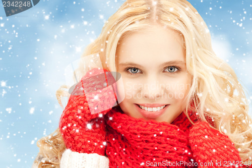 Image of beautiful woman in white sweater