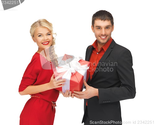 Image of man and woman with present