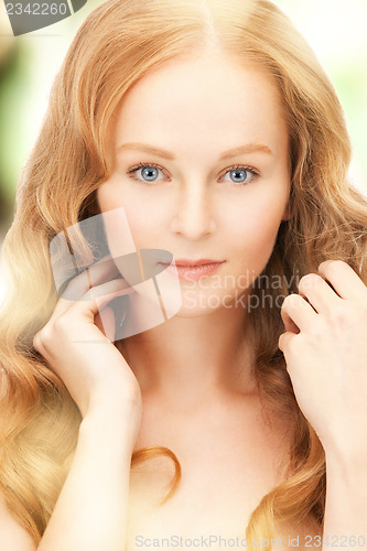 Image of beautiful woman with long hair