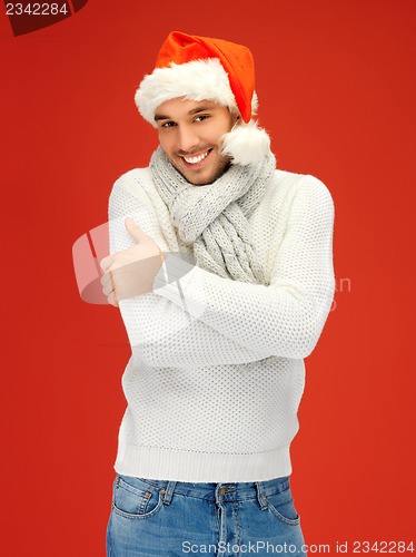 Image of handsome man in christmas hat