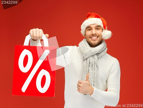 Image of handsome man in christmas hat