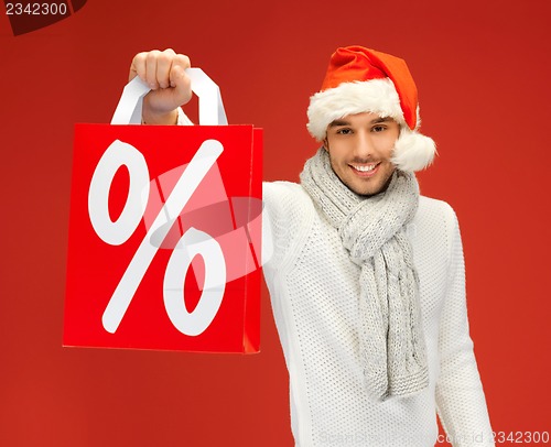 Image of handsome man in christmas hat