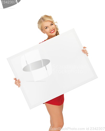 Image of lovely woman in red dress with blank board