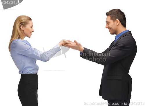Image of man and woman showing something on the palms