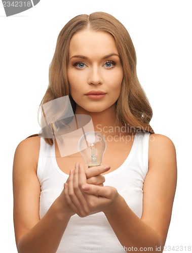 Image of woman with energy saving bulb