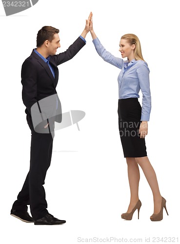 Image of man and woman giving a high five
