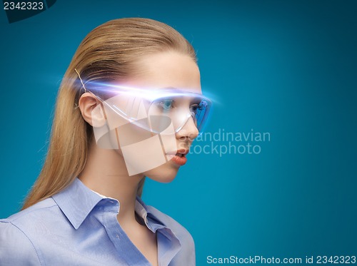 Image of businesswoman with digital glasses