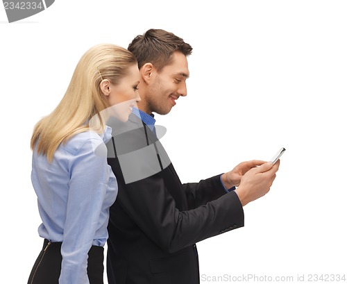 Image of man and woman reading sms