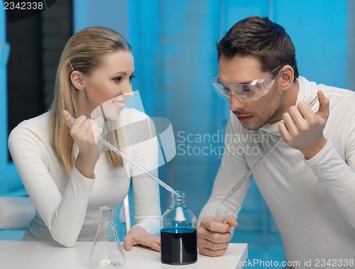 Image of man and woman in laboratory