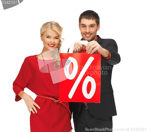 Image of man and woman with shopping bag