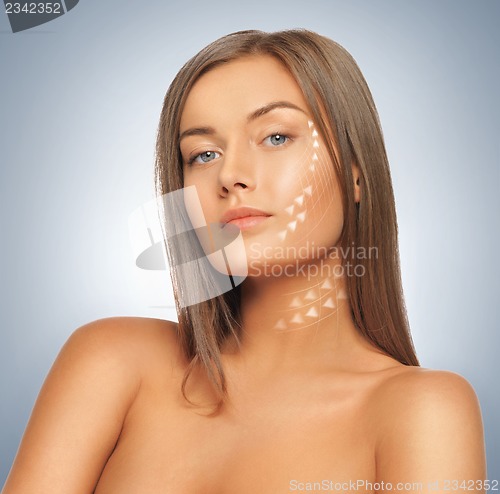Image of face and hands of beautiful woman