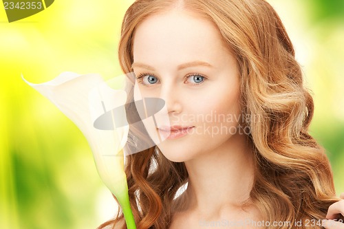 Image of beautiful woman with calla flower