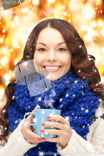 Image of woman with blue mug