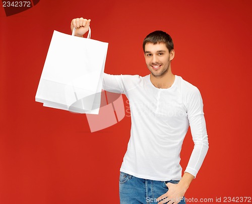 Image of man with shopping bags