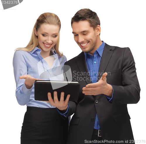 Image of man and woman with tablet pc