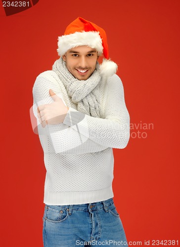 Image of handsome man in christmas hat