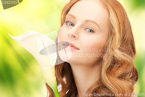 Image of beautiful woman with calla flower