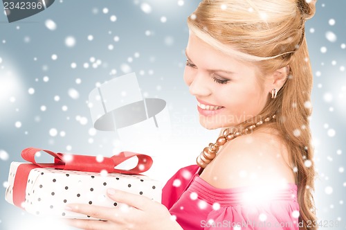 Image of happy girl with gift box