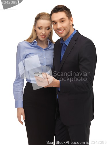 Image of man and woman reading sms