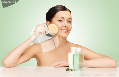 Image of woman with sponge