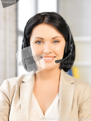 Image of friendly female helpline operator