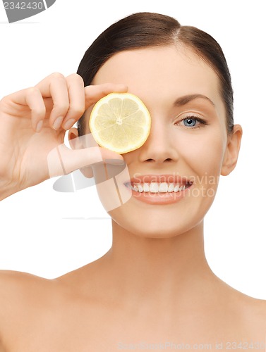 Image of woman with lemon slice