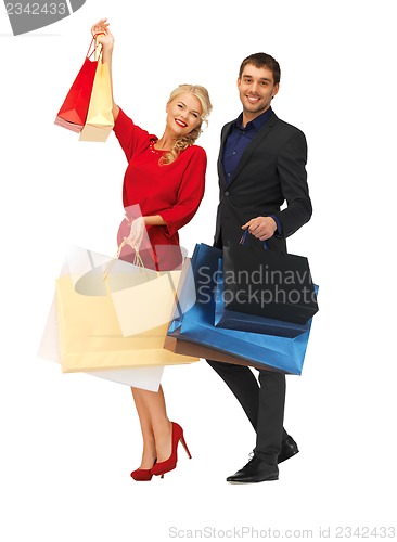 Image of man and woman with shopping bags