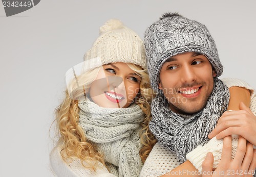 Image of family couple in a winter clothes