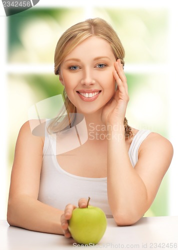 Image of woman with green apple