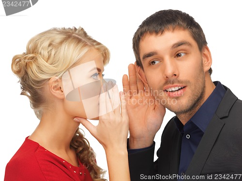 Image of man and woman spreading gossip