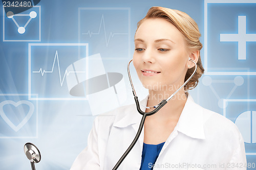 Image of attractive female doctor with stethoscope