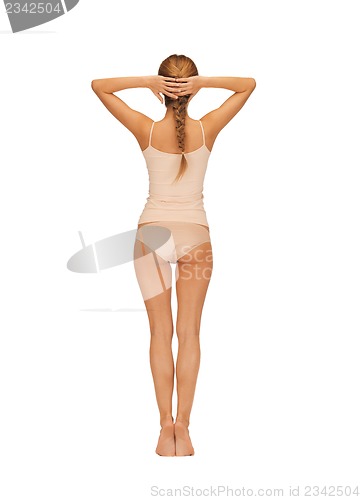 Image of rear view of beautiful woman in cotton undrewear