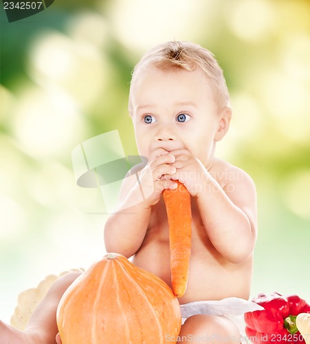 Image of baby boy with vegetables