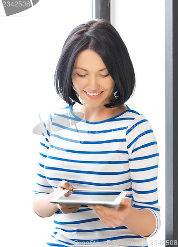 Image of happy teenage girl with tablet pc computer