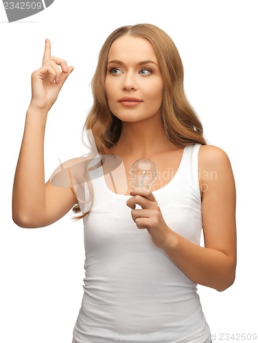 Image of woman with energy saving bulb