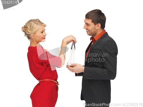 Image of man and woman with present