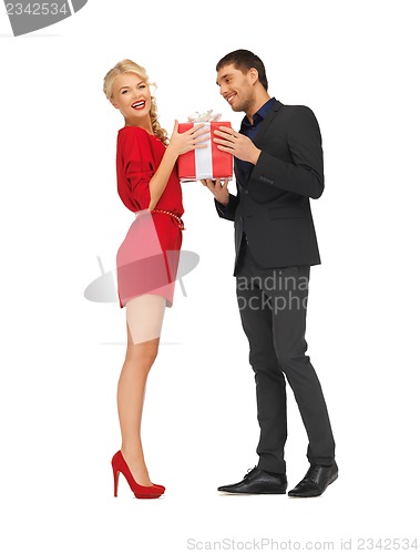 Image of man and woman with present