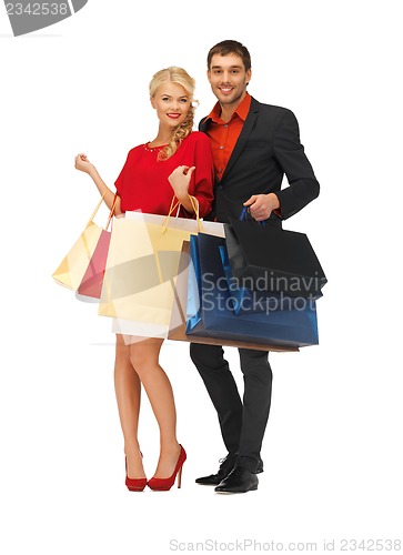 Image of man and woman with shopping bags
