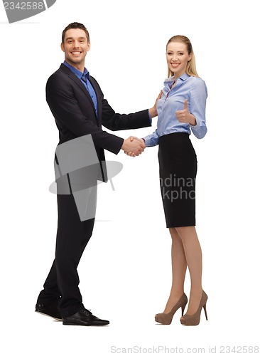 Image of man and woman shaking their hands