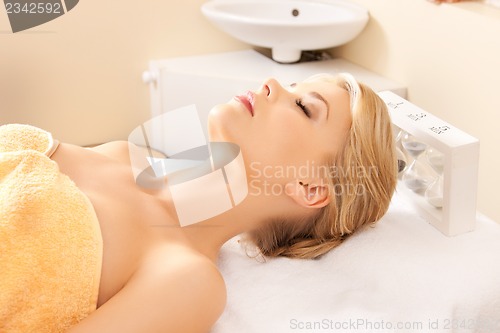 Image of beautiful woman in spa salon